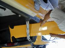 Install the front half mounting brackets on the driver side and passenger side frame.