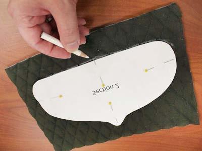 Lay the ironing board fabric on top with the right side facing up.