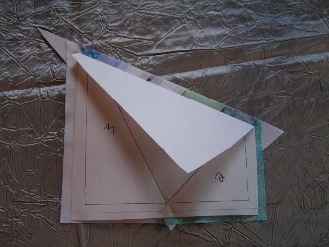 17. Place a background fabric triangle in position for sewing (right