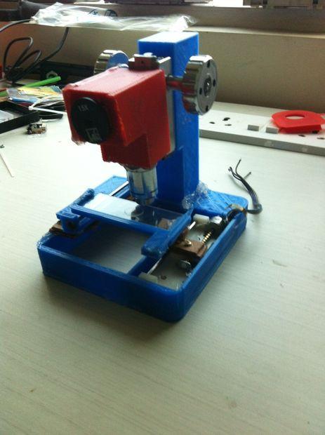 Some examples 3D Printed microscope, semi automatic. http://www.