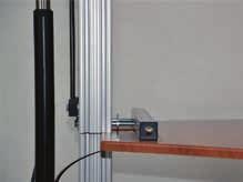 Raise the lifting assembly to attach the work surface Once you have connected your cables, plug the unit into an outlet and press