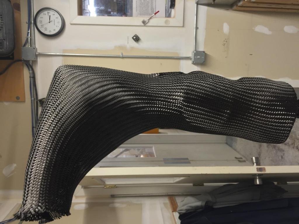 x Cover the entire model in a final layer of 12K carbon fiber braid at 45 degrees.
