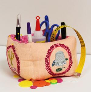 Crafty Pin Cushion Organizer An embroidered pin cushion organizer keeps sewing essentials in reach, and brightens any room's decor.