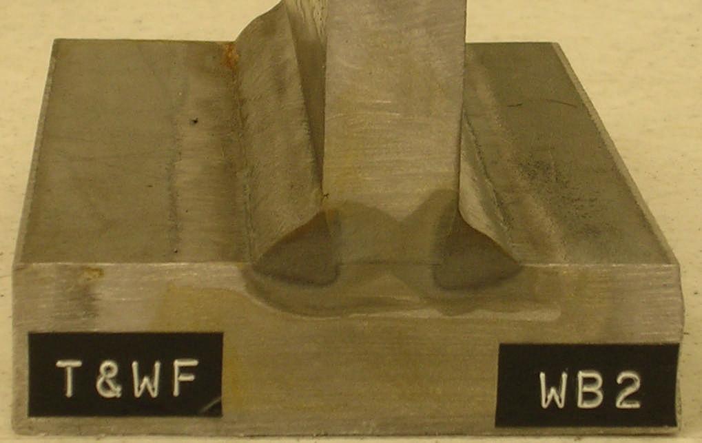 Figure 5.0 Etched cross-section of the GMAW welded tee section. The illustration of Figure 5.