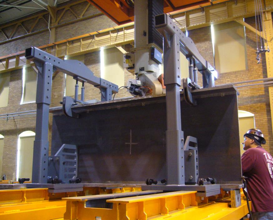 Figure 18.0 An 8-ft long model beam being prepared for fabrication in the vertical position.