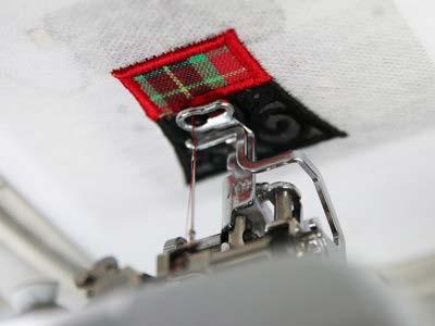Place the hoop back on the machine, and embroider the rest of the