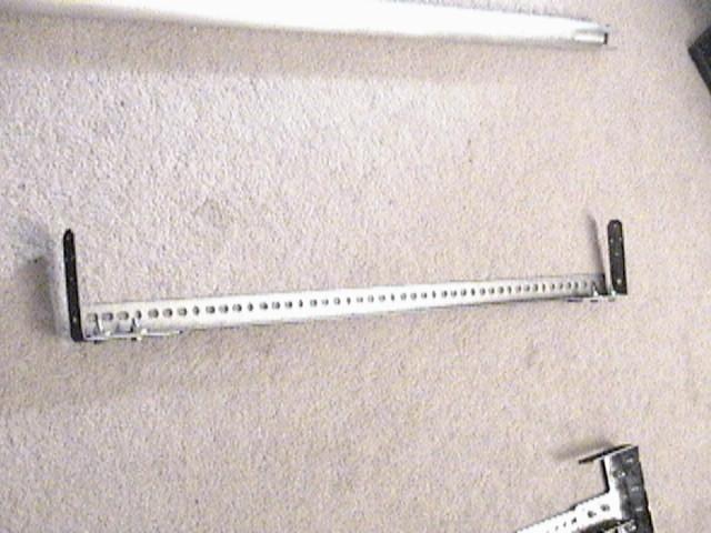 I then attached the two un-cut 90º angles onto the un-cut 3" L bar, again always using two bolts for any given structure to insure rigidity: I then took the same wheel components from the original