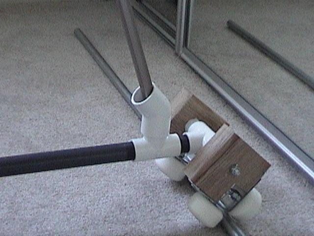 and wing nut for each arm. The arm's length is determined by the tripod used, and so careful measurement is required before one starts hacksawing their raw PVC pipe.