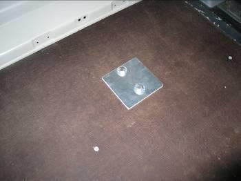 The first under mount will be bolted through the floor of the Sprinter. Use the stainless steel angle, extra bolts, and square plate to modify the under mount and bolt through the floor.