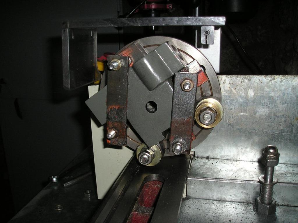 Start with a pilot drill about 3mm then open the hole until your lathe boring tool will enter at centre height Mount the casting on the face plate with great care.