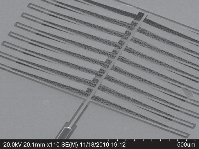 Pull-down electrode Cantilever tuners Q = 1882 Q = 1588 Q = 1234 t b = 2 μm SU-8 coated SiCr Figure 15. Scanning electron micrograph of electrostatic fringing-field cantilever array.