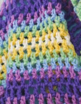 Soft Rainbow Crochet Wrap Instructions Continued from page 5 Rows 24-31: Repeat Rows 22 and 23. Row 32: Repeat Row 22. Rows 33-43: Repeat Rows 1 and 2 five times, then repeat Row 1.