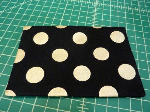 8. Find one of the two 13" x 13" lining panels. Place it right side up and flat on your work surface. 9.