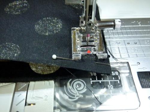 Using a ½" seam allowance, stitch along both sides and across the bottom, pivoting at the corners. 13.