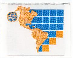 Square; white; cotton: map of North and South American in orange with blue squares representing the Atlantic Ocean and three orange squares, the WAGGGS Trefoil at the top left.