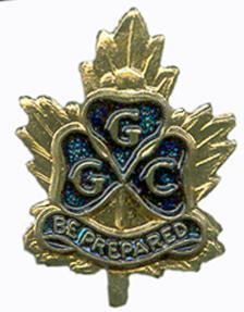 X1007 2. Canadian Guider (May 1938) 3. 1938-1963 4. Maple leaf; gilt; metal: blue enamel Trefoil with text CGG and scroll with text BE PREPARED centred on maple leaf. 5.