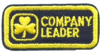 Rectangle; blue; cotton: Trefoil, text COMPANY LEADER and edging in yellow stitching. 5. Company Leader (1983-1996) 1. X1022 2.
