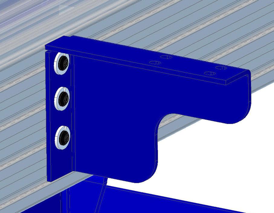 the lower table side extrusion, with the flanged face of the nut facing towards the inside of the table.