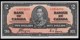 , however we evaluate the pair as pressed AU s due to the lack of embossing. S/N:E/R1385496-7. 974. 1935 Bank of Canada $50. CH BC-13. VF.