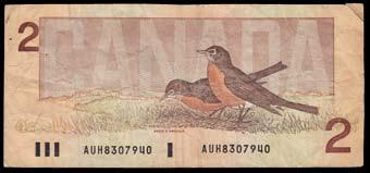 15 Pcs. $30-$40 1053. 1986 Bank of Canada $2. CH BC-55b. Fine, number 13 in pencil on front. Rare, we ve recently sold a high grade example, only 7 known to date. Thiessen - Crow, AUH8307940.