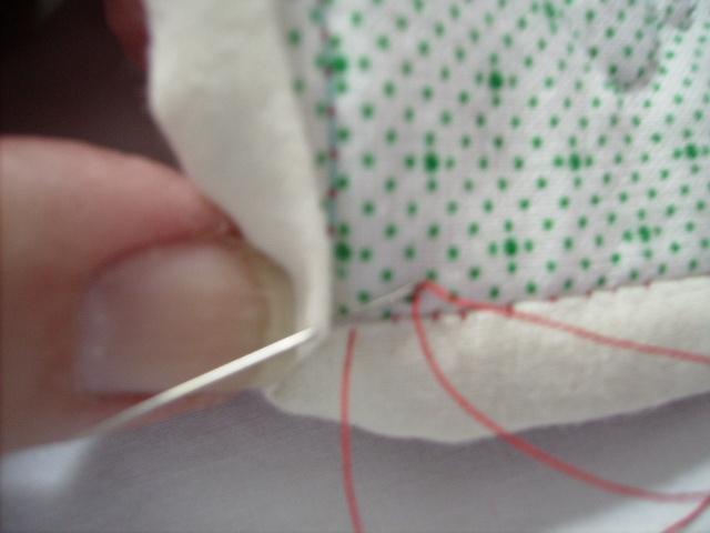 After every two or three stitches, tug the thread so that the stitches nearly disappear into the fabric. 11.