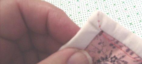 15. Take three or four stitches toward the inner corner of the