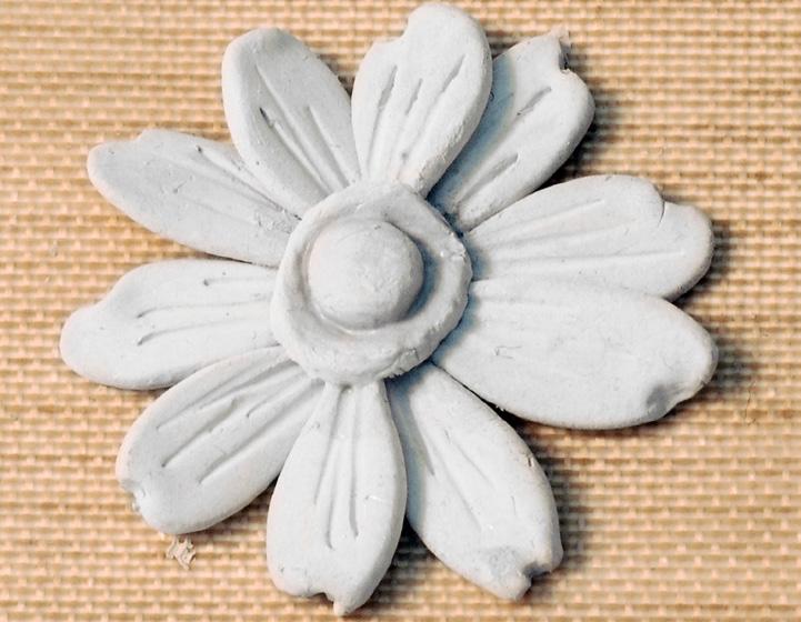 If that s the case, once the petals are dry, use 600-grit sandpaper, followed by a polishing pad (such as a 3M ProPolish pad) to refine the edges.