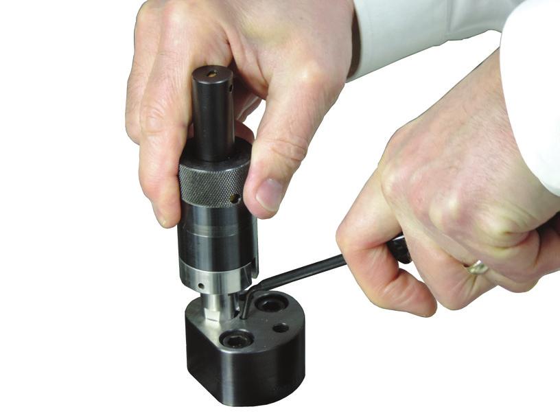 This tool may be used for both the punch holder assembly, and the