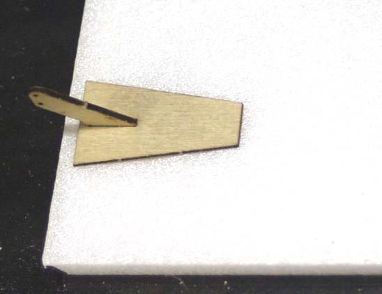 With a sharp xacto and a straight edge, cut a 45 degree bevel in the leading edge of the rudder.