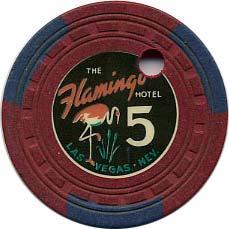 Value: $500 From: 1948 This 5 th issue H-mold from the Flamingo was in play in the late 1940 s. It is blue with 3 light green inserts and has a drill hole cancellation.