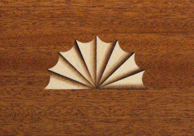 This is a traditional design element used in Early American Furniture, and it can be used to good effect in contemporary furniture. We re going to make the fan from maple, with a field of mahogany.