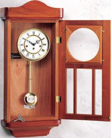 Cut a 3/8"-wide rabbet on the back edges of the dial frame, to bring it flush with the door.