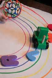 Have some ideas for toys of each color ready. Do you have blocks in several colors? Or letters? What about cars or even markers?