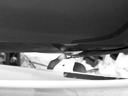 Step 3) Check fit the rear lower spat, ensuring at the tab fits in between the bumper and the factory rear lower. See image #17.
