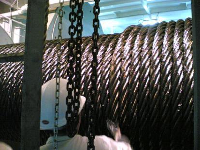 The fluid property of oil type lubricants with a good application medium such as a pressure lubricator, helps to wash the rope to remove abrasive external contaminants.