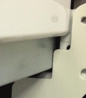 When the stand is set at the proper height, the top ledge of the side plate extension fingers should be approximately ¼ below the bottom edge of