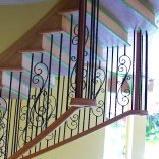 HOLLOW AND SOLID IRON BALUSTERS SANTA FE HAMMERED SERIES & SCROLL SERIES Powder coated iron stair parts featuring hollow baluster line.