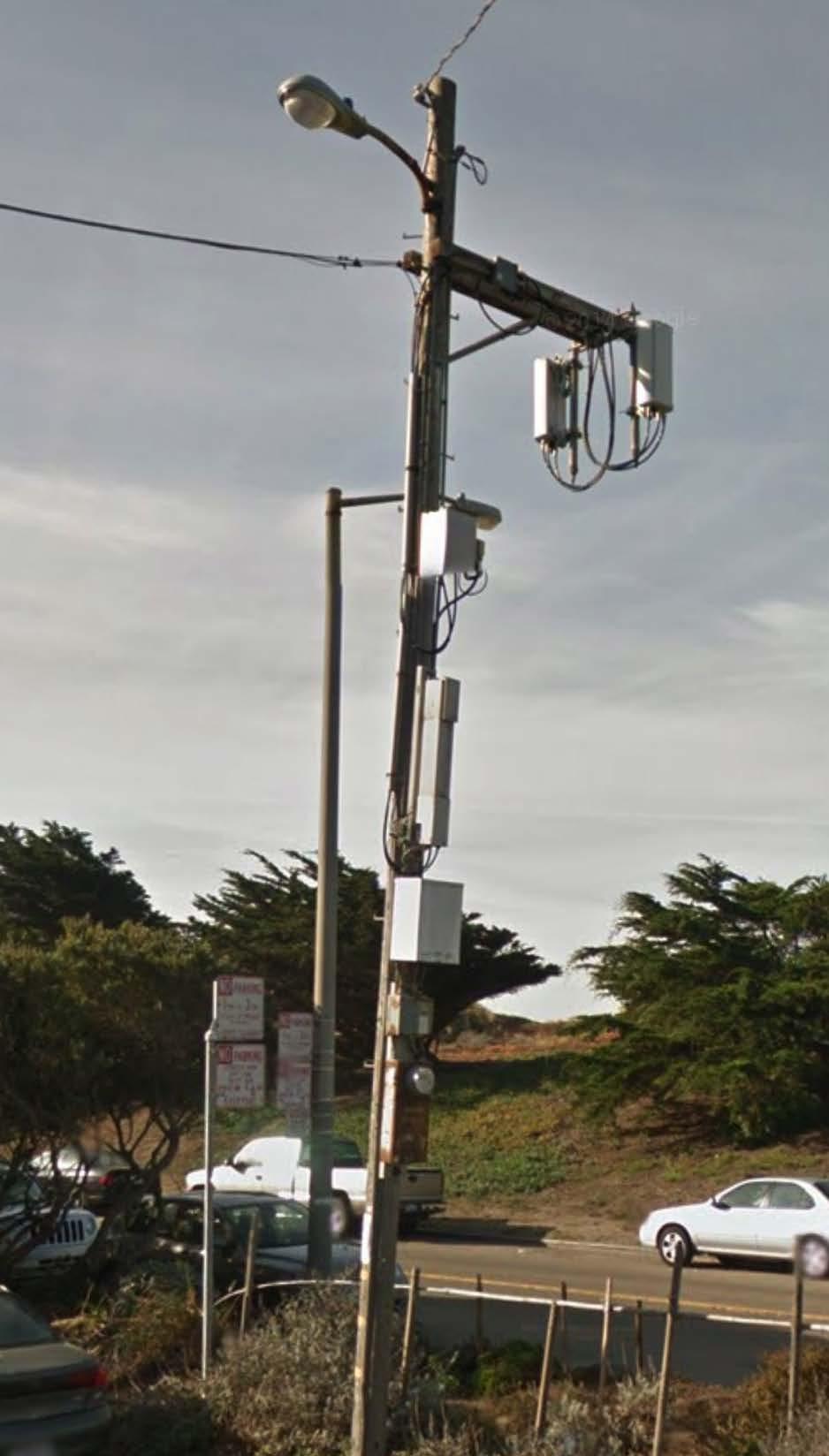 Example Personal Wireless Services Facility Two panel antennas and equipment attached to an existing wooden utility pole (not owned by City) Disfavored Design (would not be recommended for approval
