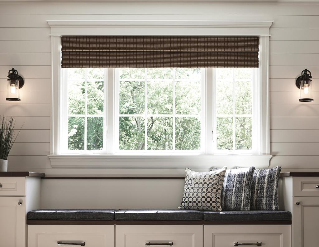 On the interior, a beautiful shiplap wall is the perfect place for a Colonial grille window.
