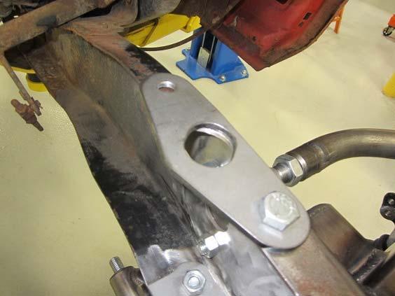 23) With lines scribed slowly grind away the frame rail for the steering