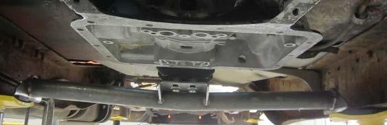 Once the engine and transmission are installed, the transmission mount can be bolted in.