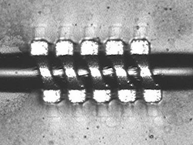 Optical photomicrographs for 3D air core on-chip inductor under