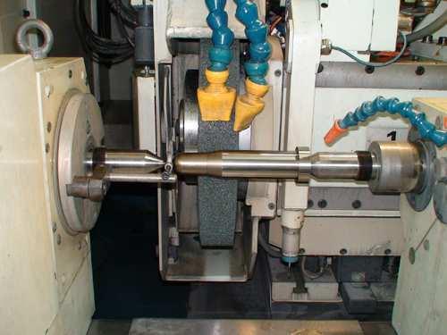 3.10 Grinding machine Process : Grinding machine consists of a power driven grinding wheel spinning at the required speed (which is determined by the wheel s diameter and manufacturer s rating,