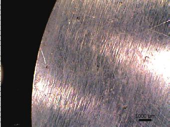 9 Image of Metal Plate Surface Viewed via Wide-View Camera By double-clicking in the window to further zoom in and focus on adhesion (1) shown in Fig.