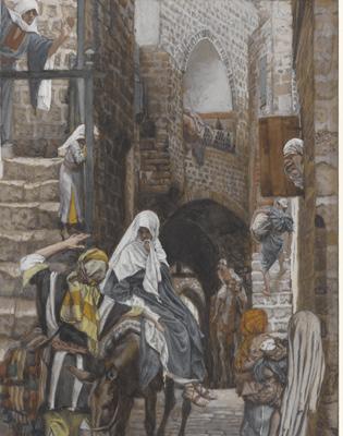 Description of A Street in Jaffa, 1886 87/89 A solitary figure stands in a narrow street lined with tall architectural structures interrupted by various passageways, stairs, and windows.