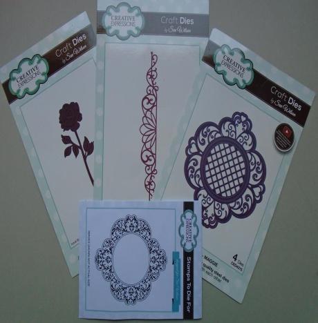 Maggie die, the Configurations graceful lace die, the damask delight stamp, and the finishing touches wild rose die.