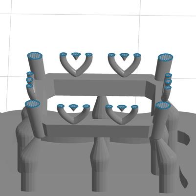 (Fig. 15.7). Figure 15.1: Ring with angled orientation. Figure 15.2: Using the slider tool in PreForm to see unsupported islands that will float away during printing.