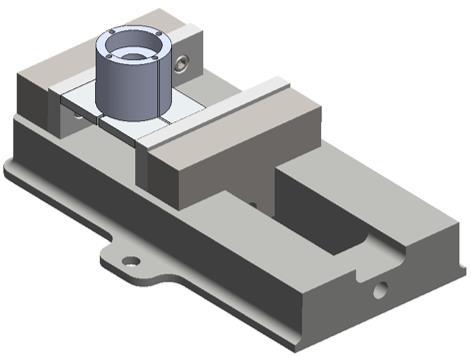 The scratch marks on the part and jig allow the part to be replaced into the mill in the correct orientation for post machining operations or modifications.