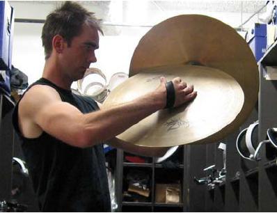 6 DINGS: Dings are played by hitting the top portion of the underside of the left cymbal bell with the edge of the right cymbal.