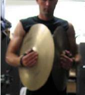 Again, try to straighten your fingers to avoid dampening either cymbal.